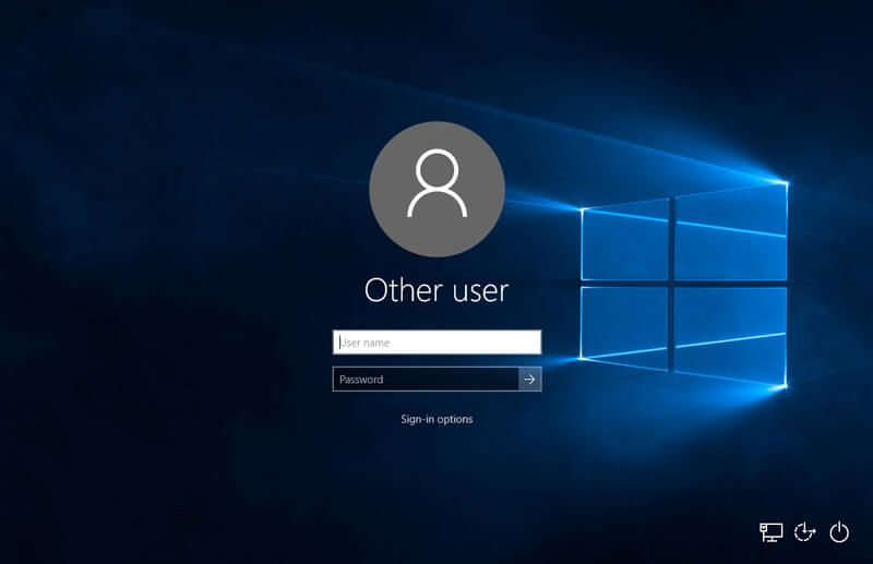 La imagen muestra la pantalla de login de Windows pidiendo un usuario